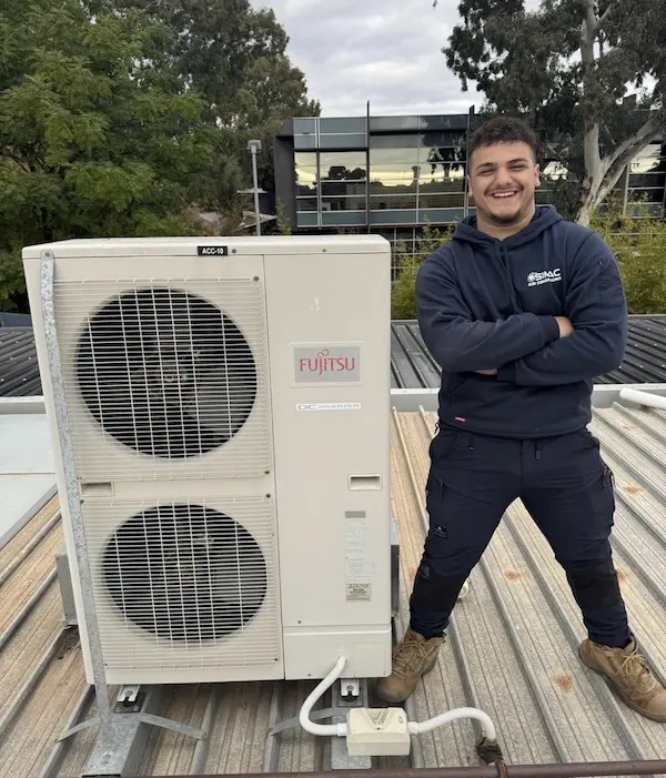Profile picture of Ben smiling in a car with his thumb up.
