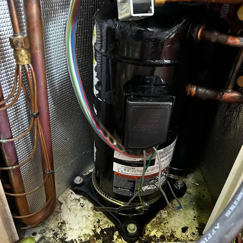 An air conditioner compressor leaking.